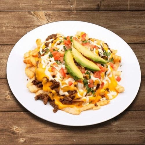 French fries topped with grilled steak, cheese, and sour cream in Kennewick, WA.