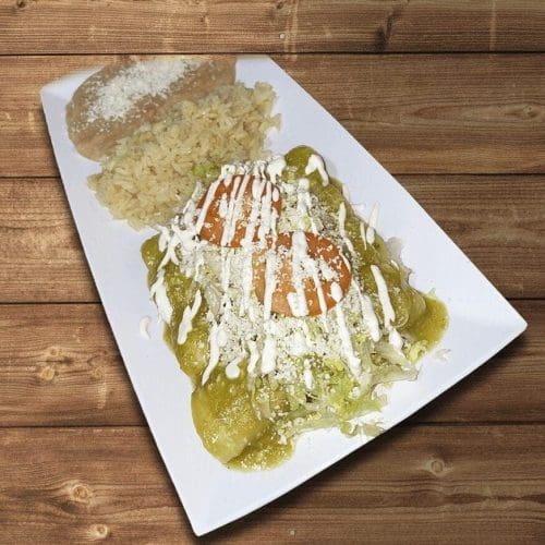 Green enchiladas filled with shredded chicken, topped with green sauce and fresh cheese in Kennewick, WA.