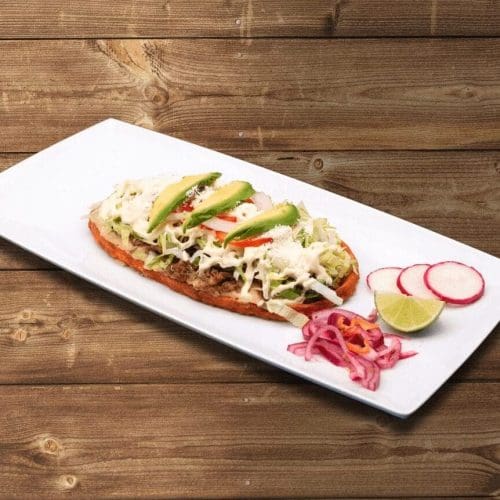 Mexican huarache with beans, meat, and fresh cheese in Kennewick, WA. Mexican huarache with beans, meat, and fresh cheese in Kennewick, WA.
